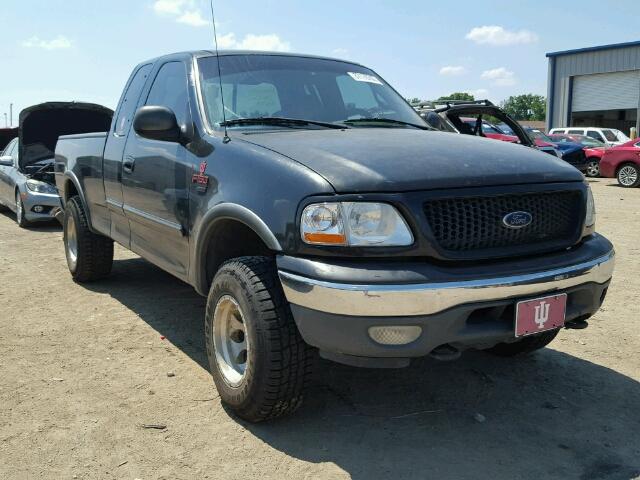 1FTRX18L0YNA42299 - 2000 FORD F150 BLACK photo 1