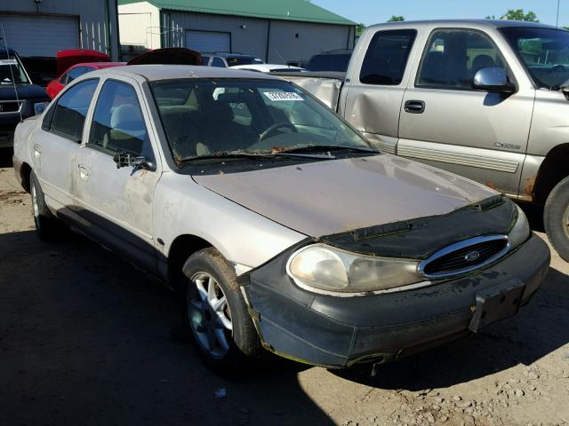 1FAFP6630XK153024 - 1999 FORD CONTOUR SE TAN photo 1