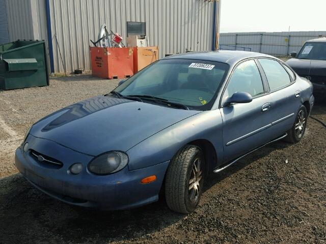 1FAFP53U4XG244954 - 1999 FORD TAURUS BLUE photo 2