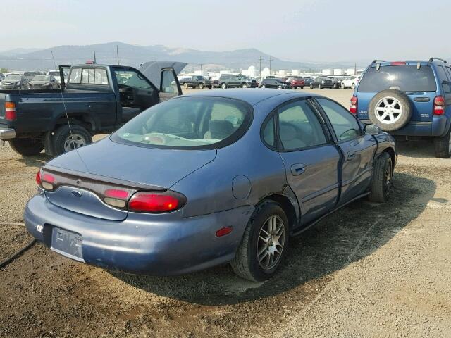 1FAFP53U4XG244954 - 1999 FORD TAURUS BLUE photo 4