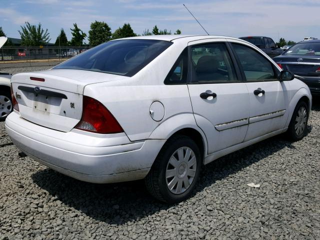 1FAFP34Z64W148906 - 2004 FORD FOCUS SE C WHITE photo 4