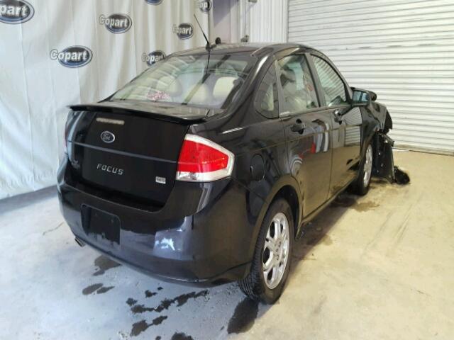 1FAHP36N09W140231 - 2009 FORD FOCUS BLACK photo 4