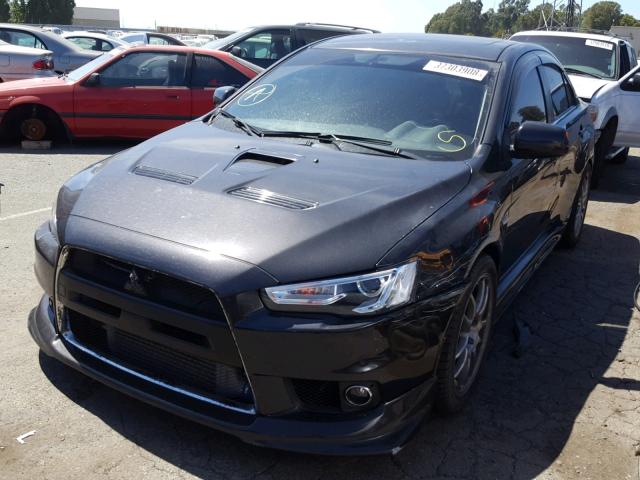 JA32W5FV9AU021591 - 2010 MITSUBISHI LANCER EVO BLACK photo 2