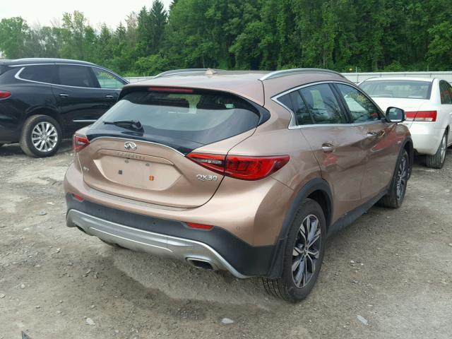 SJKCH5CR1JA058821 - 2018 INFINITI QX30 BASE PINK photo 4