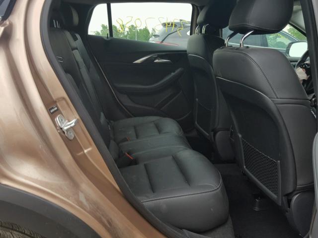 SJKCH5CR1JA058821 - 2018 INFINITI QX30 BASE PINK photo 6