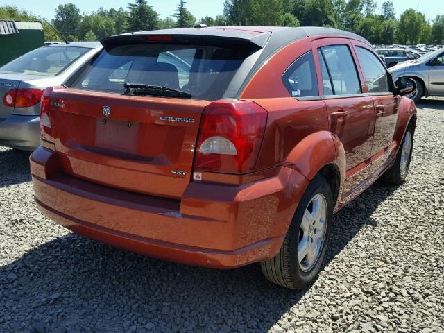 1B3HB48A79D206635 - 2009 DODGE CALIBER ORANGE photo 4