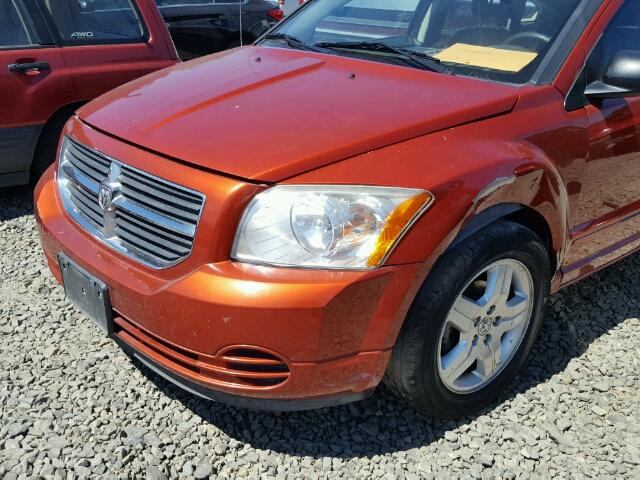 1B3HB48A79D206635 - 2009 DODGE CALIBER ORANGE photo 9