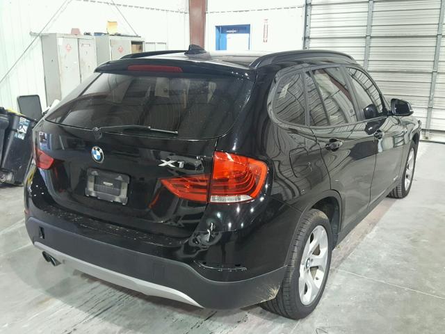 WBAVM1C53EVW52433 - 2014 BMW X1 SDRIVE2 BLACK photo 4