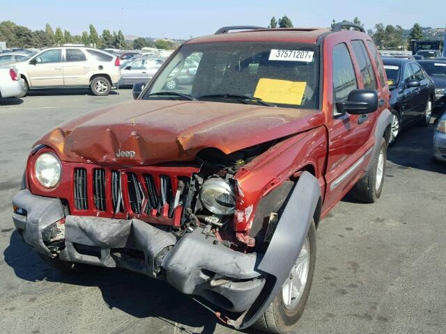 1J4GL48K42W198658 - 2002 JEEP LIBERTY SP ORANGE photo 2