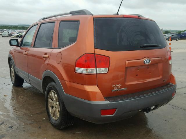 KNDJJ741595032245 - 2009 KIA BORREGO LX ORANGE photo 3