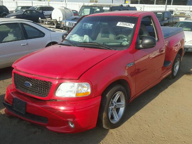 2FTZF0733XCA82721 - 1999 FORD F150 RED photo 2