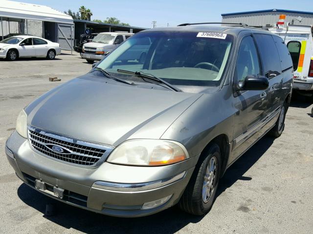 2FMDA5241XBA04722 - 1999 FORD WINDSTAR S GREEN photo 2