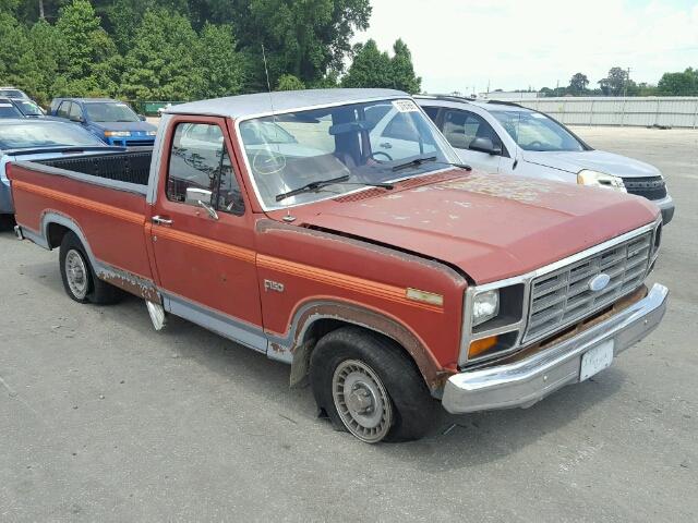 2FTDF15F1ECA09650 - 1984 FORD F150 ORANGE photo 1