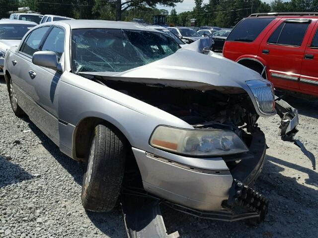 1LNHM81W04Y606667 - 2004 LINCOLN TOWN CAR E SILVER photo 1