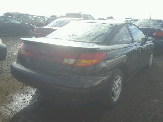 1G8ZG1278VZ345566 - 1997 SATURN SC2 BLACK photo 4