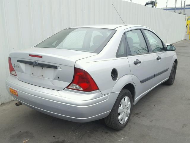 1FAFP33ZX4W176211 - 2004 FORD FOCUS LX SILVER photo 4