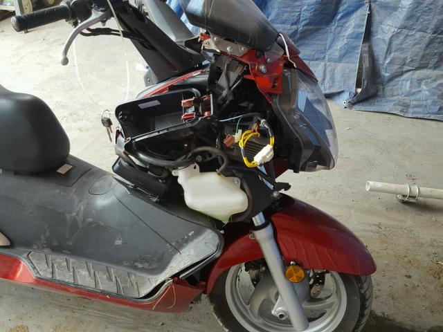 JH2PF01113K100306 - 2003 HONDA FSC600 D RED photo 9