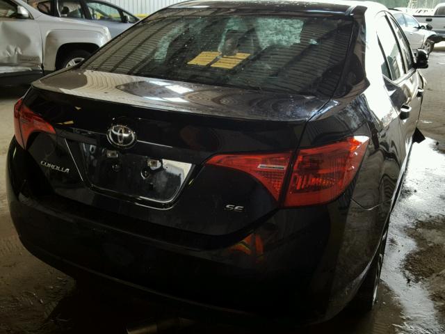 5YFBURHE4HP656849 - 2017 TOYOTA COROLLA BLACK photo 4