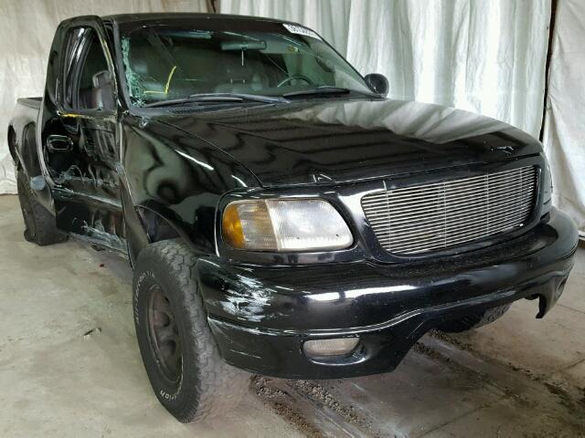 1FTRX18L21KF76749 - 2001 FORD F150 BLACK photo 1