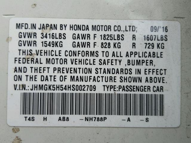 JHMGK5H54HS002709 - 2017 HONDA FIT LX WHITE photo 10