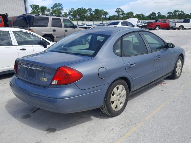 1FAHP522X1G260057 - 2001 FORD TAURUS LX BLUE photo 4