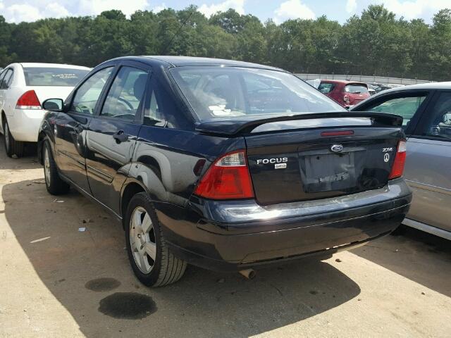 1FAHP34N56W239562 - 2006 FORD FOCUS ZX4 BLACK photo 3