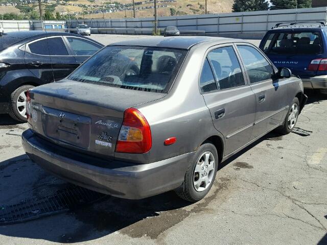 KMHCG45C21U226629 - 2001 HYUNDAI ACCENT GRAY photo 4