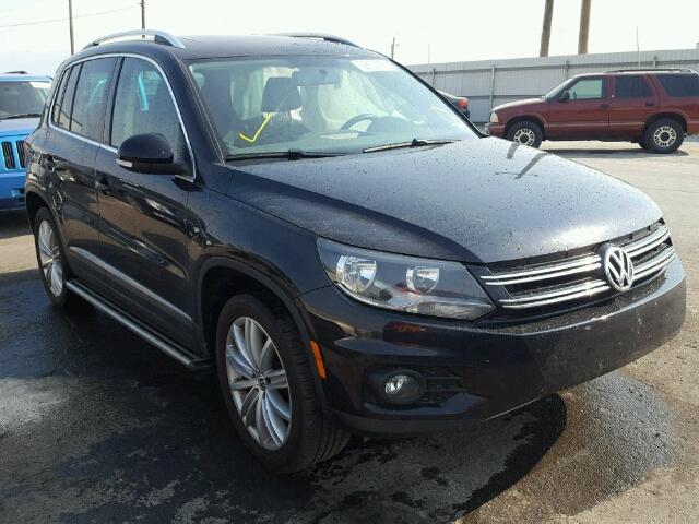 WVGBV3AX8EW587930 - 2014 VOLKSWAGEN TIGUAN S BLACK photo 1