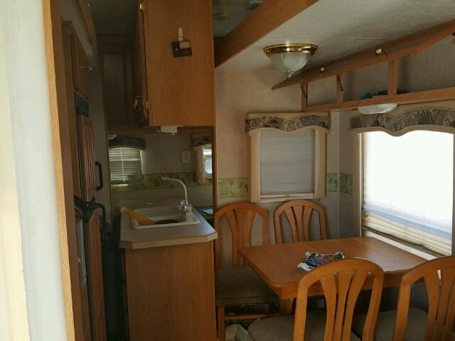 4V0FC32284A000402 - 2004 CROS ALL MODELS WHITE photo 6