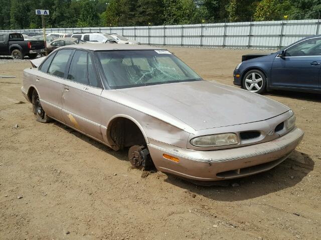 1G3HN52K9X4806177 - 1999 OLDSMOBILE 88 BASE TAN photo 1