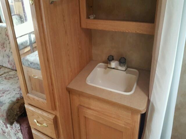 1YDT25F265E315048 - 2005 KEYSTONE HORNET WHITE photo 16