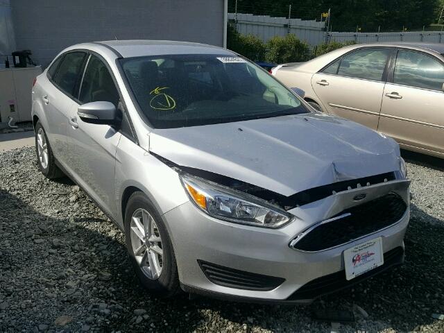 1FADP3F22FL325771 - 2015 FORD FOCUS SE SILVER photo 1