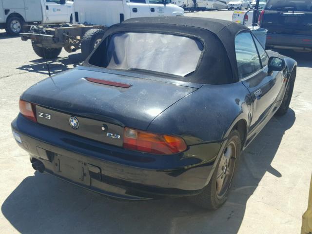 4USCH9335XLF80884 - 1999 BMW Z3 2.3 BLACK photo 4