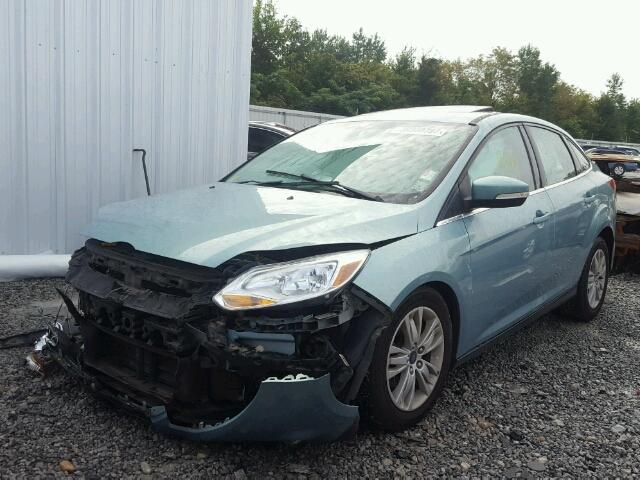 1FAHP3H22CL316594 - 2012 FORD FOCUS BLUE photo 2