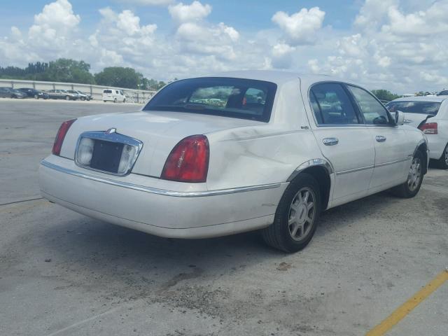 1LNHM82W42Y670710 - 2002 LINCOLN TOWN CAR S YELLOW photo 4