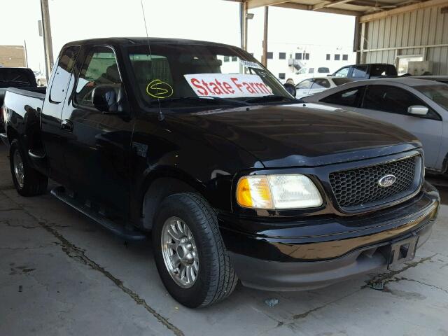 1FTRX07W22KA99344 - 2002 FORD F150 BLACK photo 1