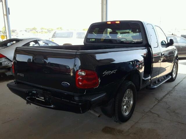 1FTRX07W22KA99344 - 2002 FORD F150 BLACK photo 4