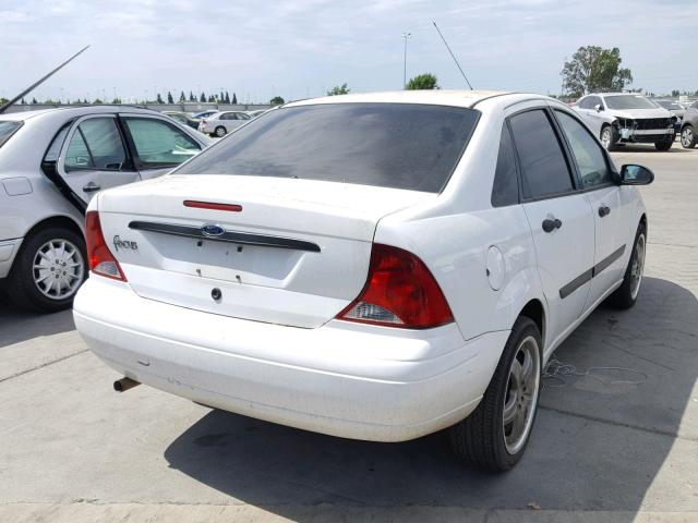 1FAFP33Z24W103978 - 2004 FORD FOCUS LX WHITE photo 4