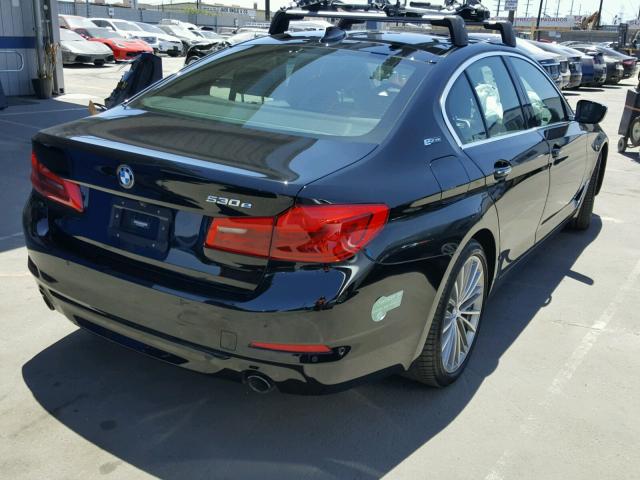 WBAJA9C53JB032957 - 2018 BMW 530E BLACK photo 4