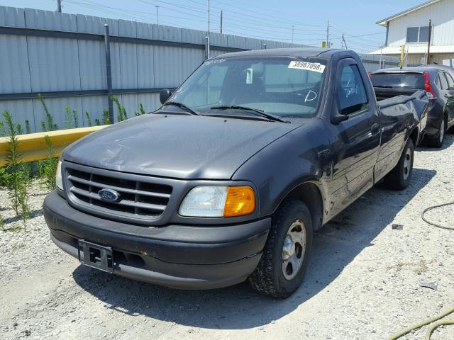 2FTRF17224CA24902 - 2004 FORD F-150 HERI GRAY photo 2