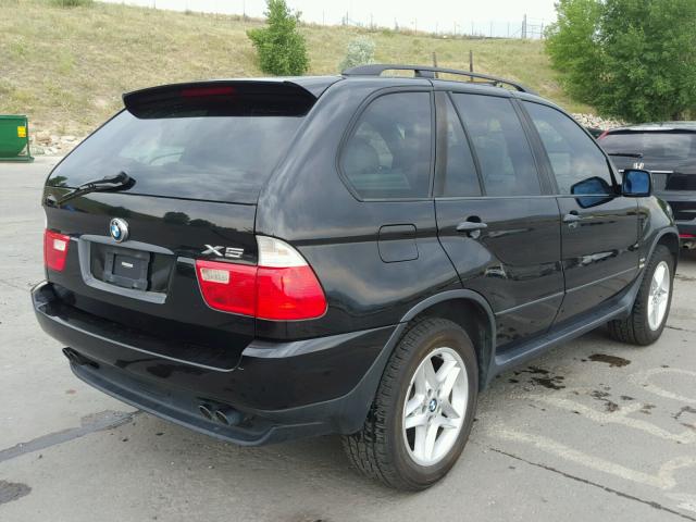 5UXFB33522LH33585 - 2002 BMW X5 4.4I BLACK photo 4