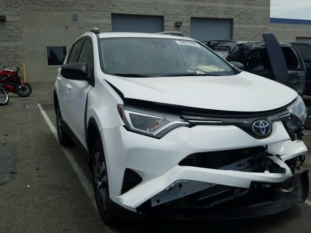 2T3ZFREV1JW440949 - 2018 TOYOTA RAV4 LE WHITE photo 1