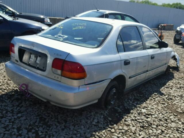 1HGEJ6678VL024564 - 1997 HONDA CIVIC LX GRAY photo 4