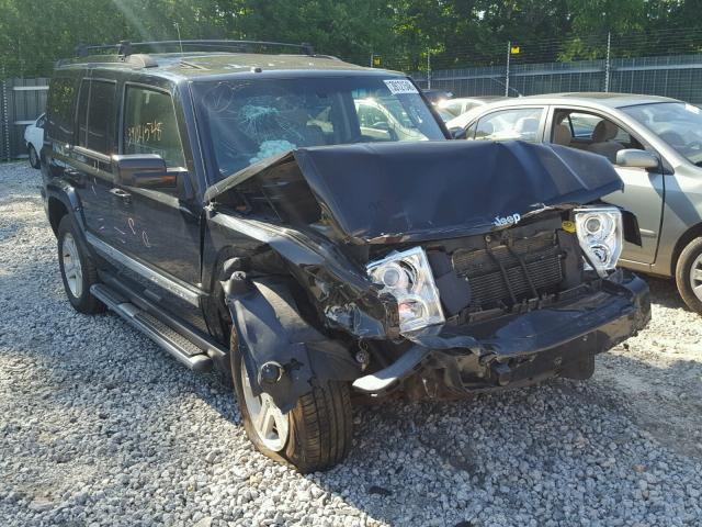 1J4RG5GT0AC118611 - 2010 JEEP COMMANDER BLACK photo 1