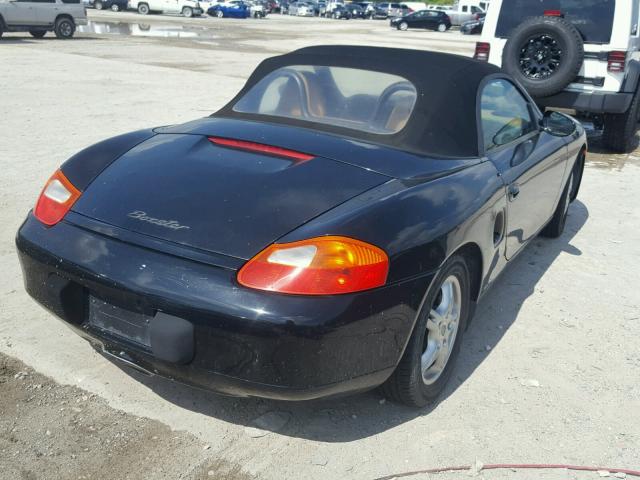 WP0CA2982XU633424 - 1999 PORSCHE BOXSTER BLACK photo 4