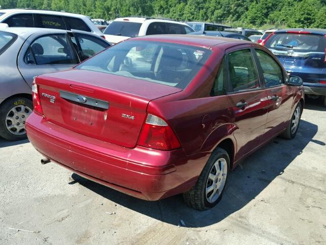 1FAFP34N05W184475 - 2005 FORD FOCUS ZX4 RED photo 4