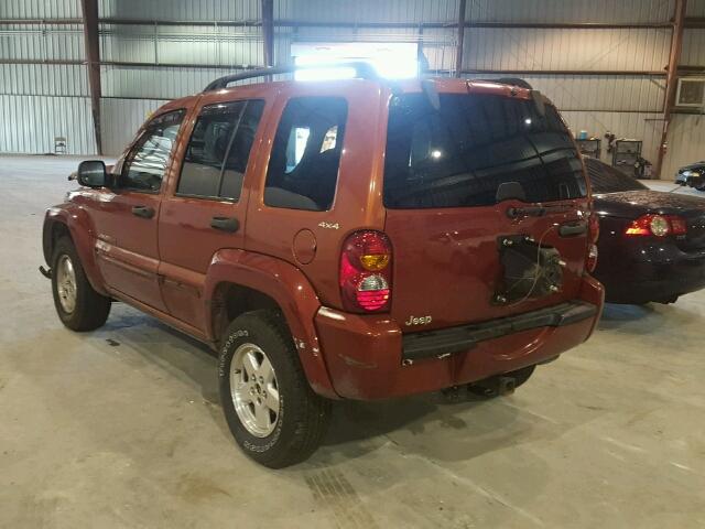 1J8GL58K52W183719 - 2002 JEEP LIBERTY LI ORANGE photo 3