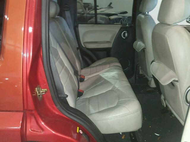 1J8GL58K52W183719 - 2002 JEEP LIBERTY LI ORANGE photo 6