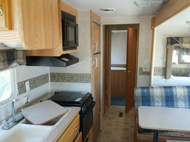 4YDT35F2827304064 - 2002 KEYSTONE HORNET WHITE photo 6