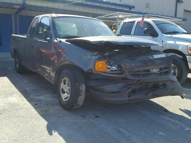 2FTRX17284CA84826 - 2004 FORD F-150 HERI GRAY photo 1